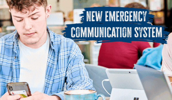 Gif of a student on their phone in a cafe with text reading 'New emergency communication system'