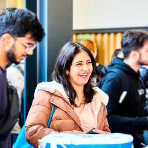 student smiling at the Graduate Recruitment fair 